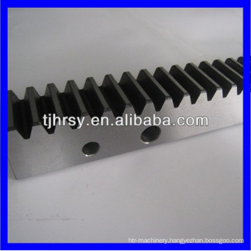 Steel hardened gear rack with mounting holes